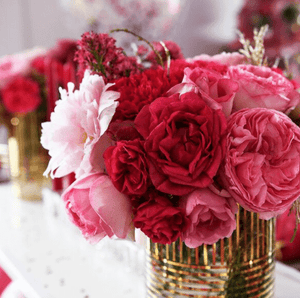 pink peonies in glamorous gold striped cylinder vase melbourne hire